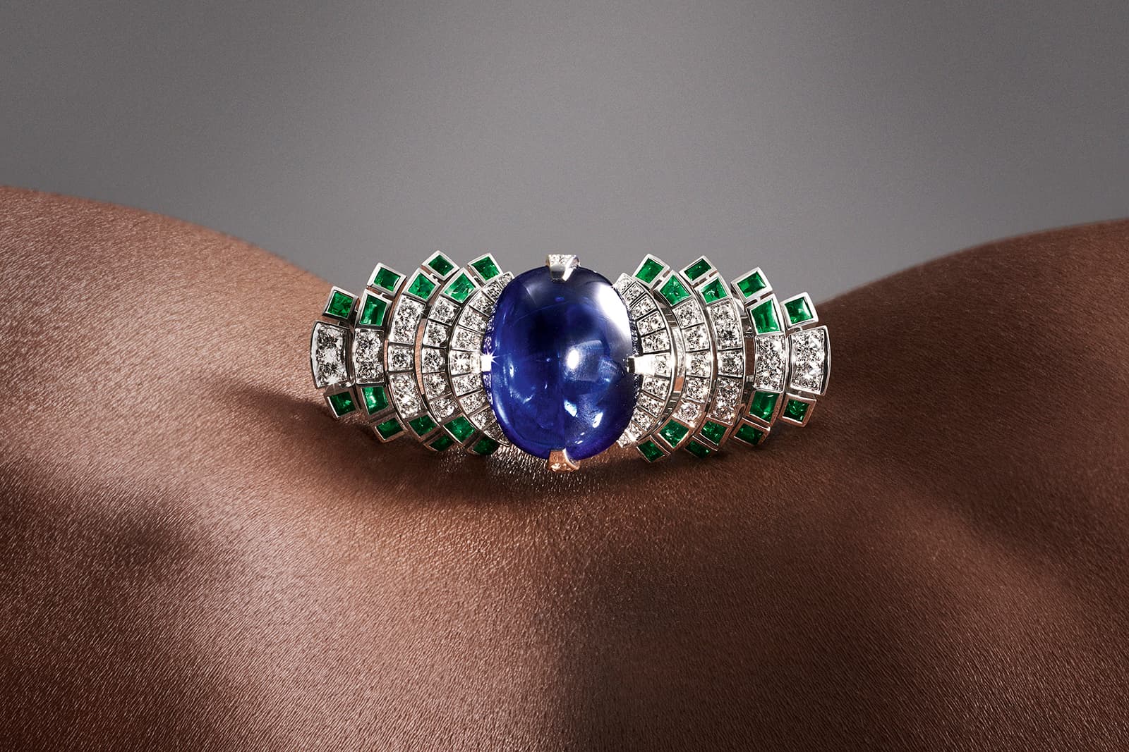 Cartier Parhelia ring with a 21.51 carat sapphire cabochon, emeralds and diamonds from the Sixième Sens par Cartier High Jewellery Collection