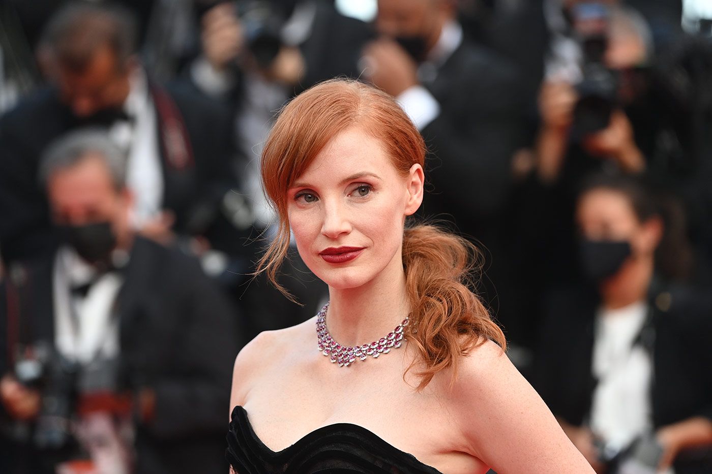  Actress Jessica Chastain wears a Chopard ruby and diamond necklace to the Cannes Film Festival 2021