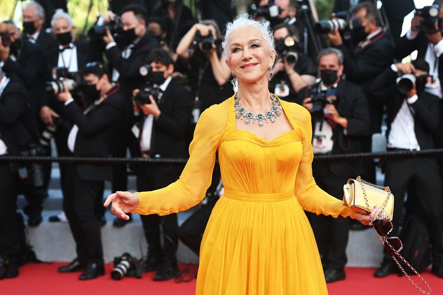 Dame Helen Mirren in an emerald and diamond jewellery suite by Dolce & Gabbana at the Cannes Film Festival 2021