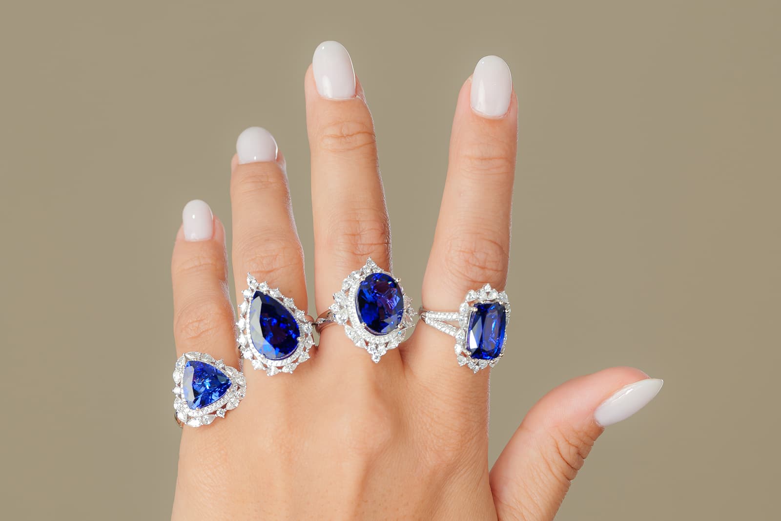  A selection of large cloured gemstone cocktail rings by Sunita Nahata