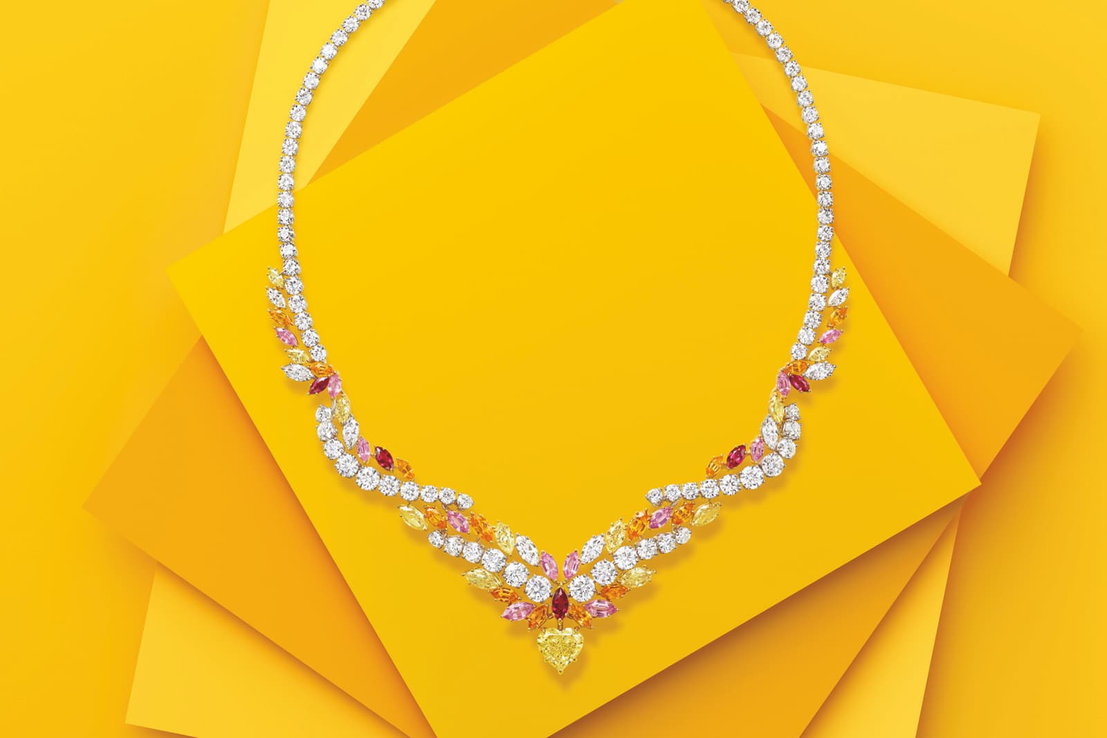 Harry Winston L - Winston Light Brilliant Glow necklace with a heart shaped yellow diamond from the LOVE Collection