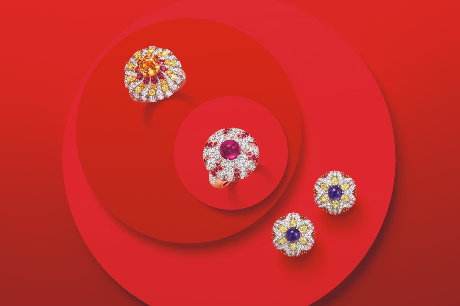  Harry Winston O - Winston Obsession Flare cocktail rings and earrings with rubellite, garnet and sapphires from the LOVE Collection