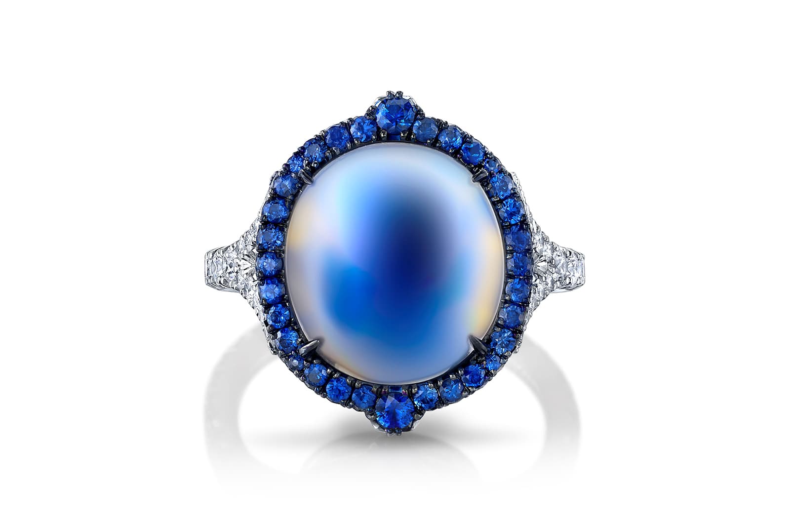  Omi Privé ring in platinum with black rhodium set with a 7.38 carat oval moonstone with sapphires and diamonds