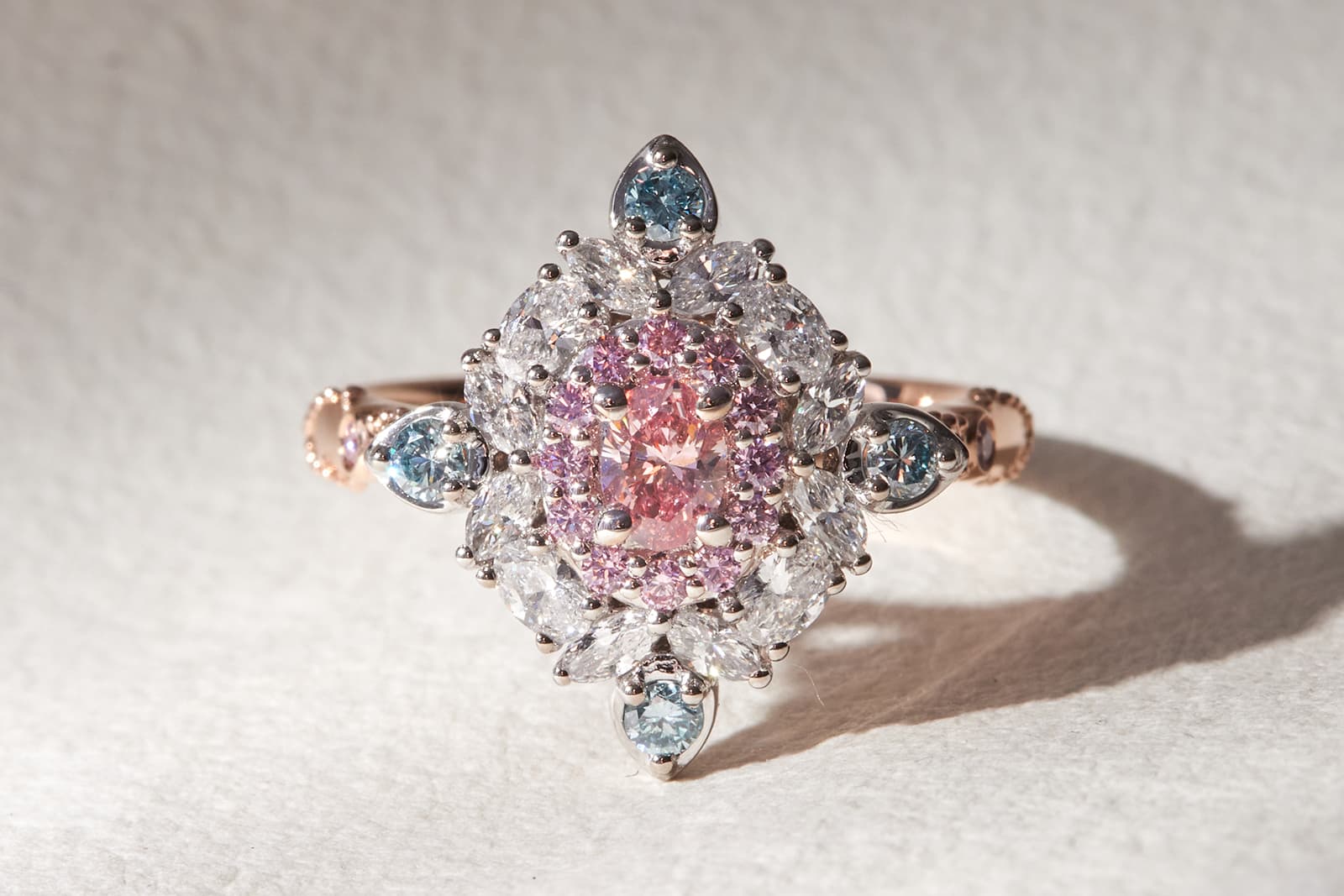 Faith Jewels Padma ring with Australian Argyle pink and blue diamonds and colourless diamonds in rose gold
