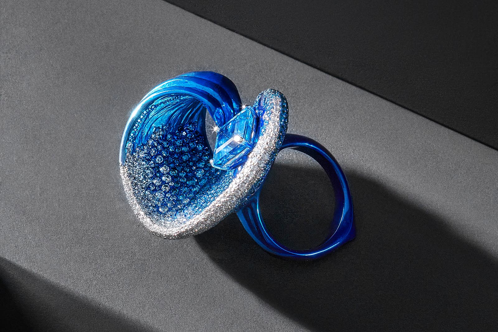  The Faith Jewels Wave ring features aquamarine, natural blue diamonds, colourless diamonds and natural Ceylon sapphires