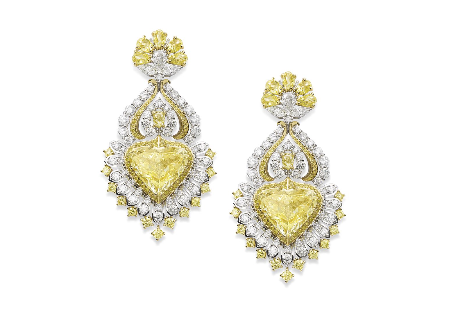  Chopard earrings from The Red Carpet collection in ethical Fairmined-certified 18k white gold and titanium set with two heart-shaped yellow diamonds and further yellow and white diamonds of various cuts