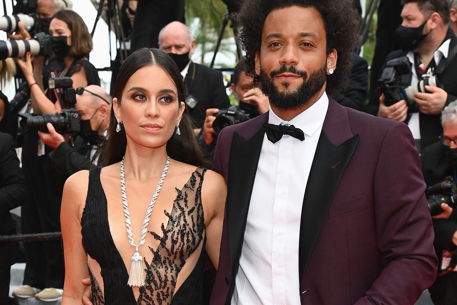  Footballer Marcelo Vieira and his wife Clarisse Alves in Chopard diamond and pearl jewellery on the red carpet