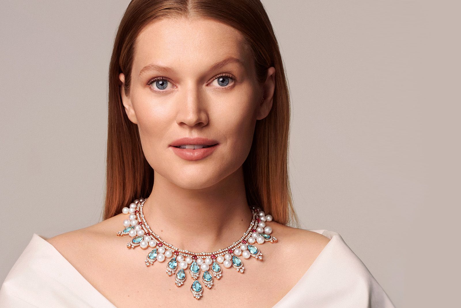 A model wears the Aquamarine Foam High Jewellery necklace from the Bulgari Magnifica collection