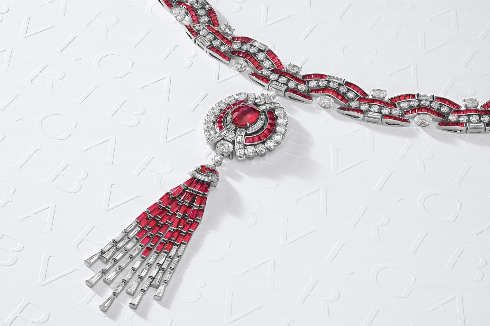  Bulgari Magnifica Ruby Metamorphosis High Jewellery necklace with a 12.02 carat Mozambique ruby, round mixed cut and buff top rubies and diamonds