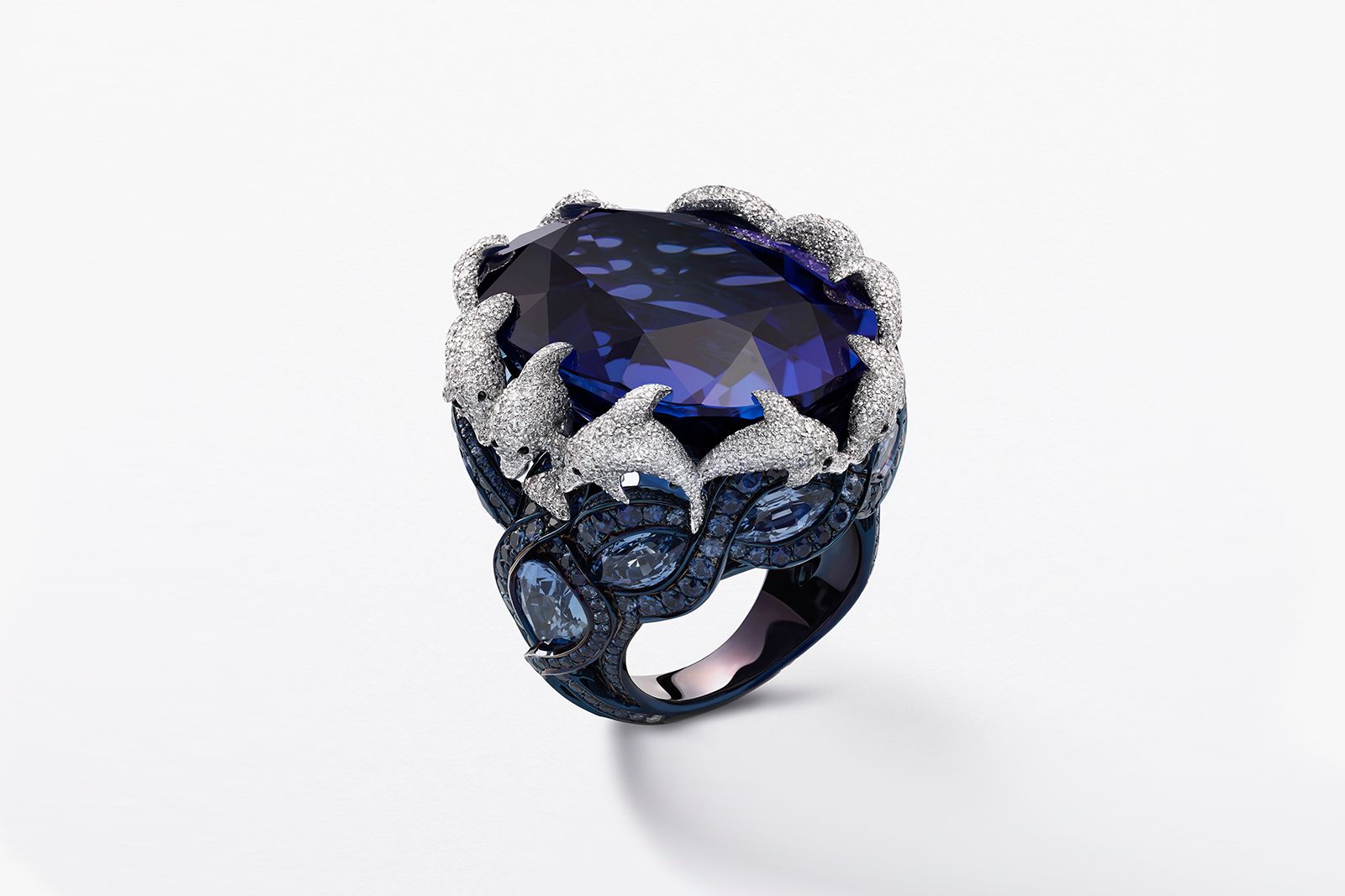 Chopard Dolphin ring from The Red Carpet collection in ethical Fairmined-certified 18k white gold featuring oval-shaped tanzanite of 59.33 carats, blue pear-shaped sapphires, pastel blue marquise-cut sapphires, further sapphires, a chalcedony onyx cabochon and brilliant-cut diamonds 