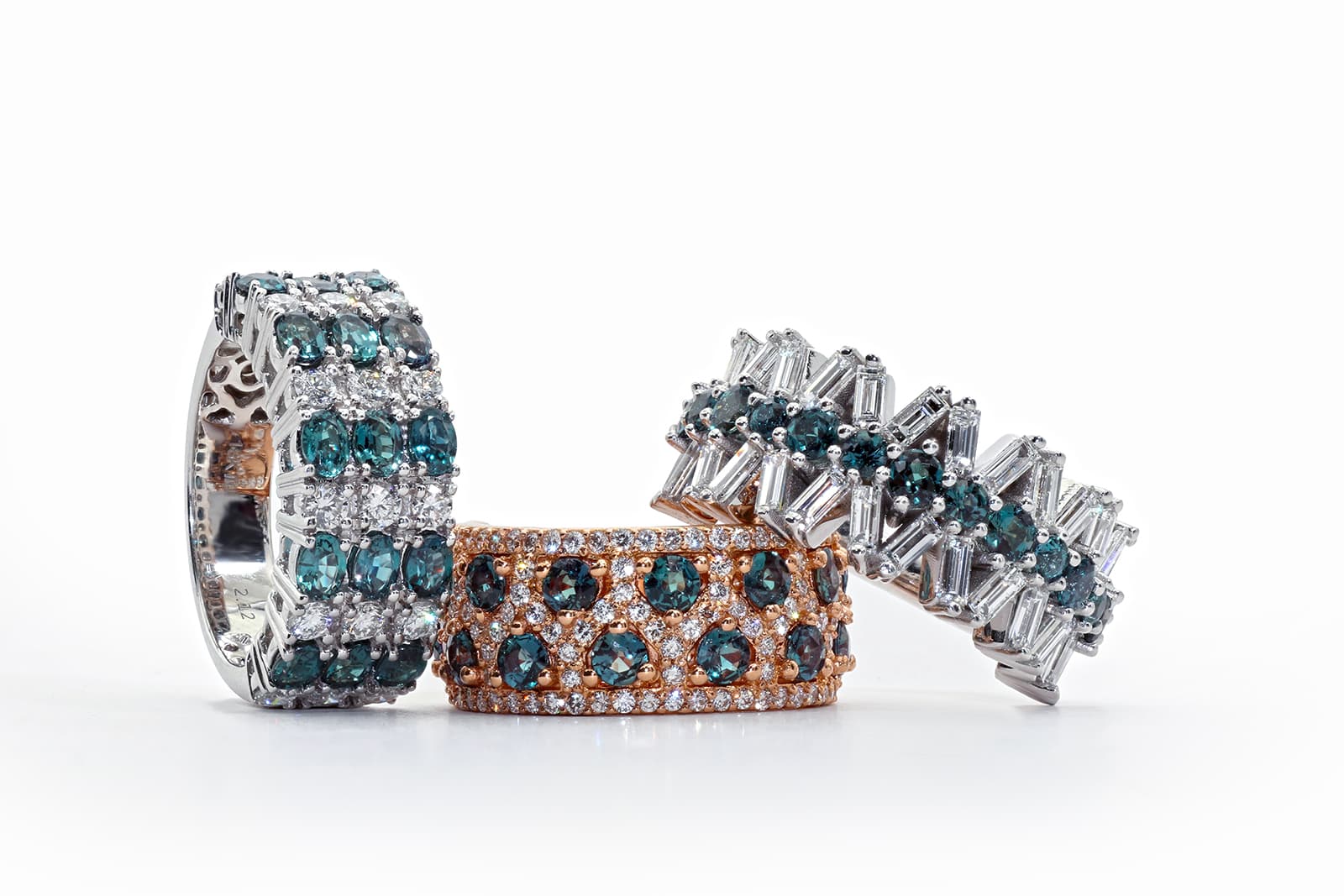 Mark Henry alexandrite and diamond eternity style rings in white and rose gold 