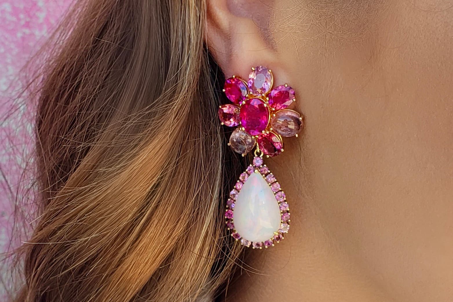 Joon Haan coloured gemstone earrings with a pear-shaped white opal