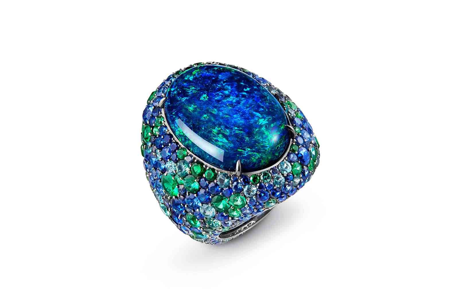  Illusion ring with a 30.98 carat oval-shaped cabochon opal from Australia and sapphires, Paraiba tourmalines, tsavorites and emeralds in white gold from the Boucheron Holographique High Jewellery collection