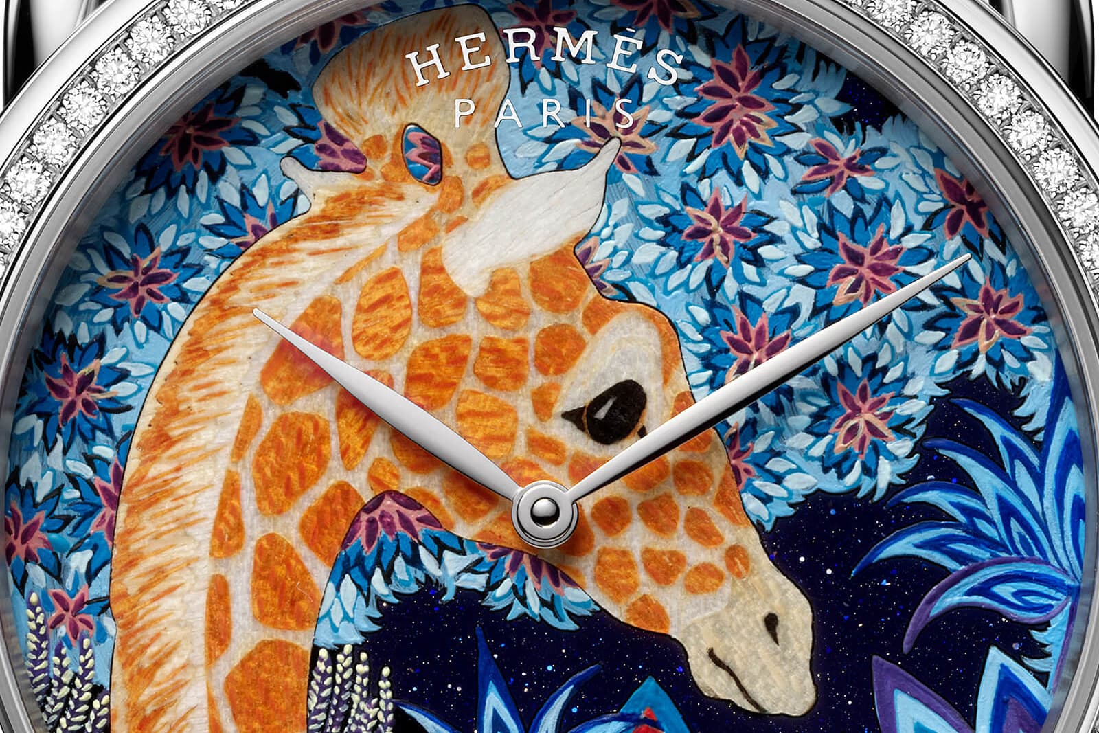 The Hermès Arceau The Three Graces timepiece is decorated with wood marquetry and miniature painting techniques