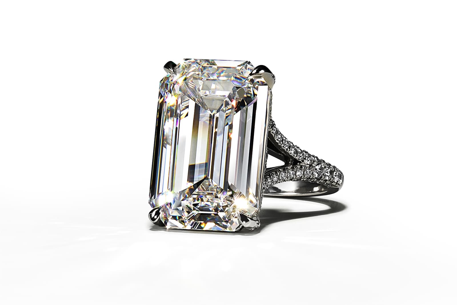 Tiffany & Co. emerald-cut diamond engagement ring with diamond-set shoulders