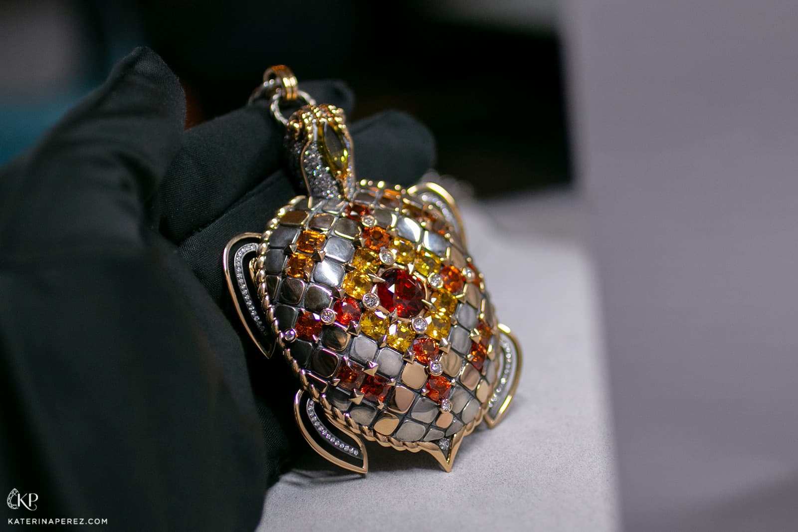  The Elie Top Tortoise pendant uses different tones of gold and coloured gemstones to great effect