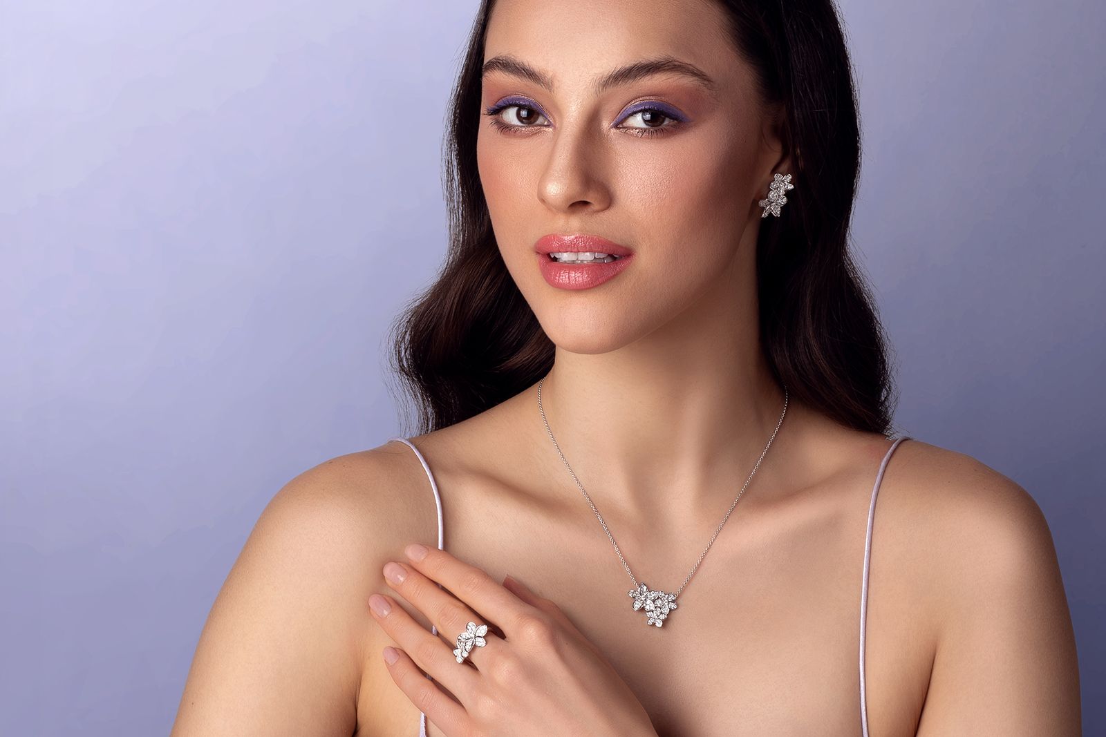  A model wears the Plumeria On My Mind Collection by Stenzhorn
