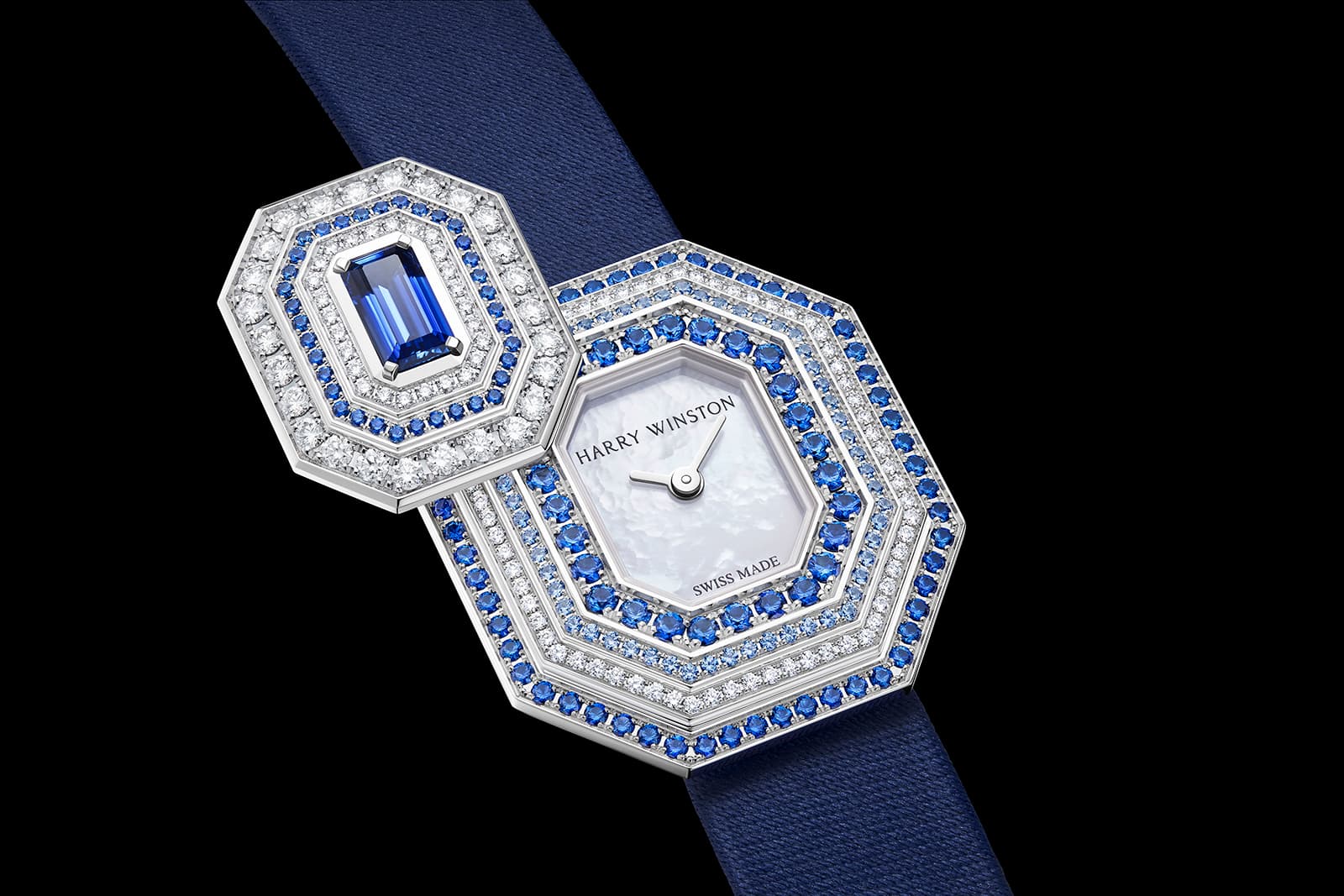 The Emerald Signature by Harry Winston timepiece with blue sapphires and diamonds 