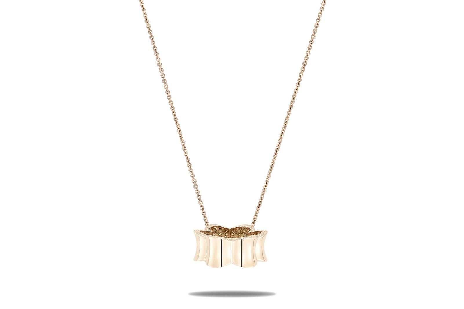  A different view of the Fullord Lotus scarf ring/pendant in 18k rose gold with diamonds