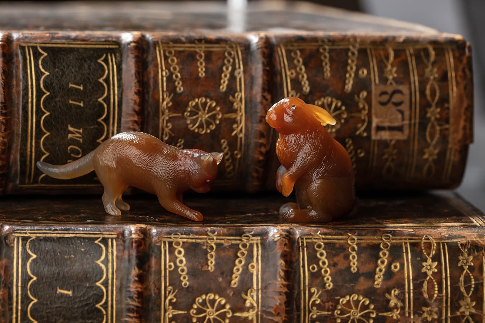  Fabergé models of a cat and a rabbit (circa. 1900) carved from agate with rose-cut diamond eyes