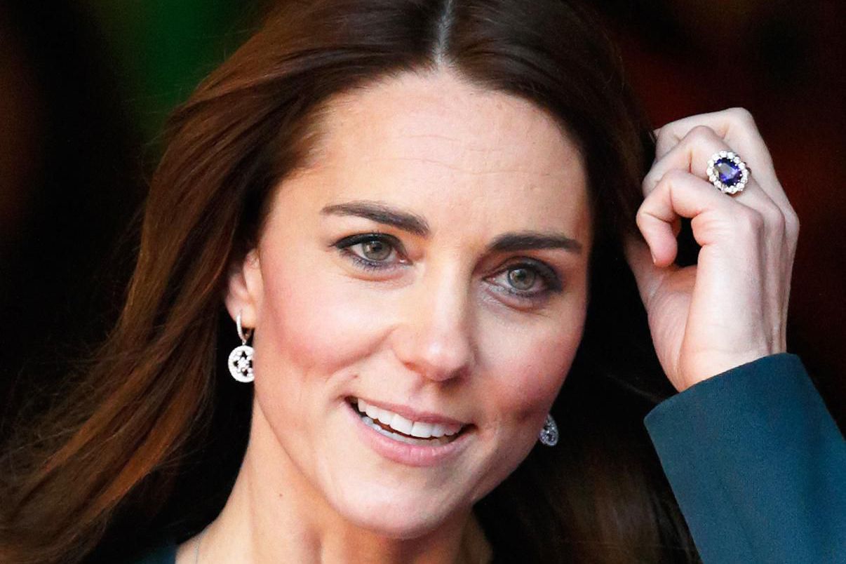 The Duchess of Cambridge Catherine Middleton wears the 12-carat sapphire and diamond engagement ring presented to her by Prince William