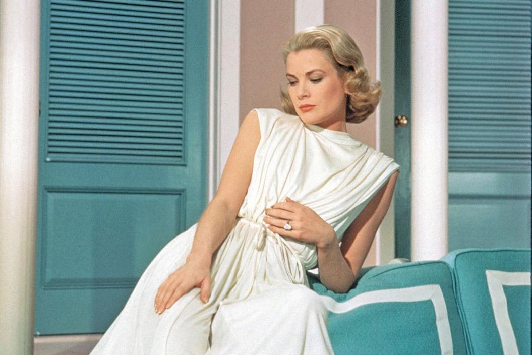 Grace Kelly, Princess of Monaco, wears a Cartier engagement ring purchased by Rainier III, Prince of Monaco