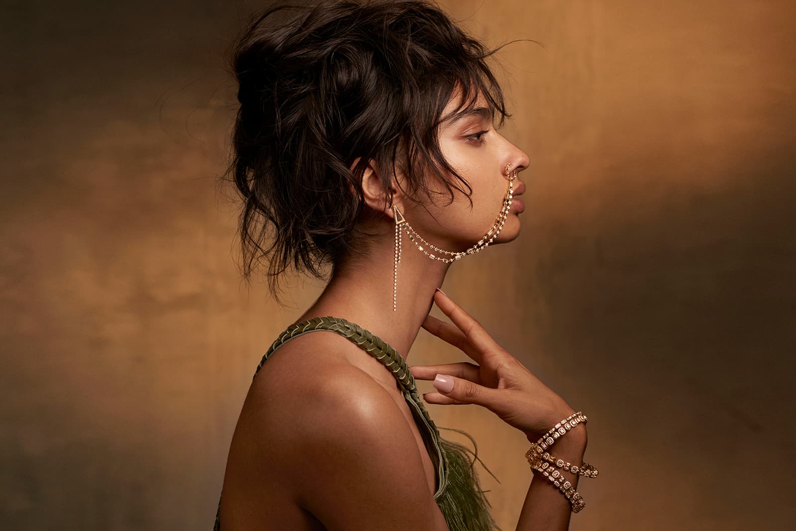  A model wears Bohemian Chic pieces from the Messika by Kate Moss Opus 2 Collection