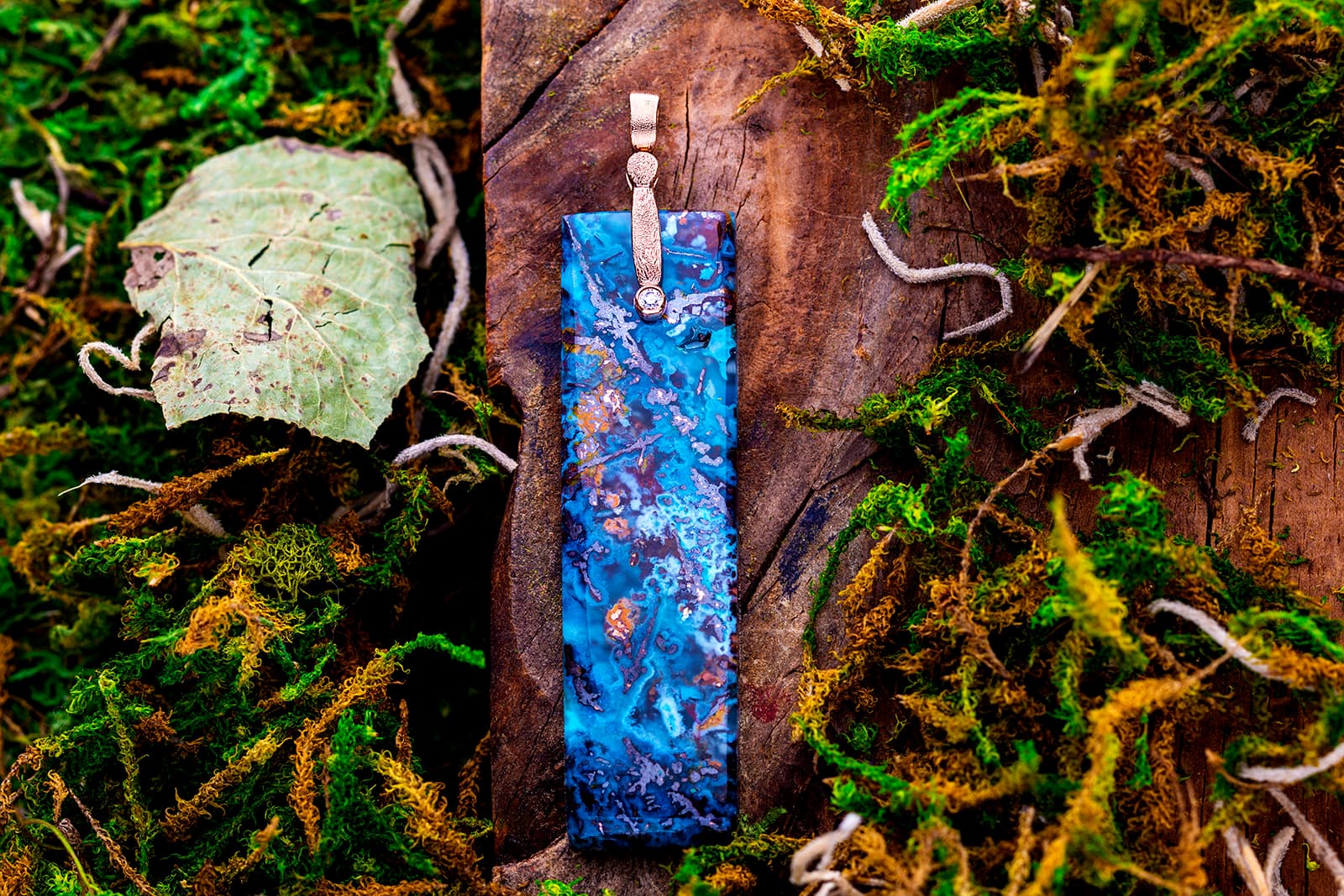  Alex Sepkus pendant with a slice of boulder opal infused with copper