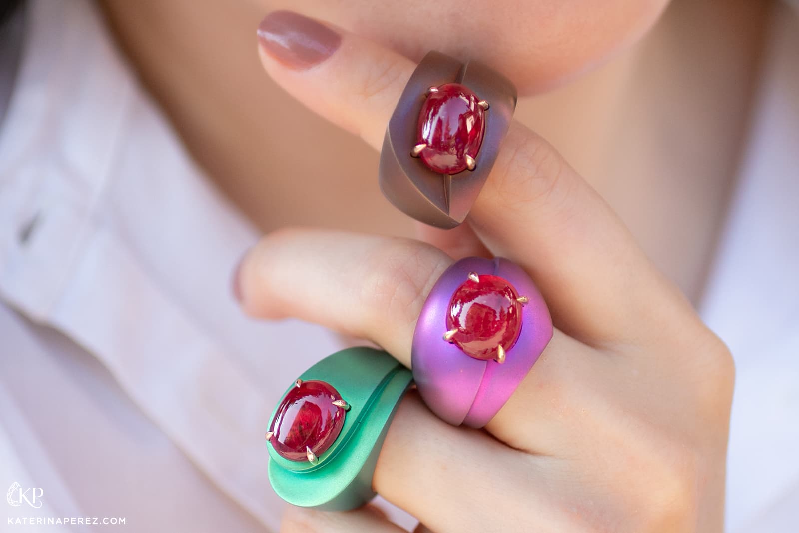  Three Mashandy Collection rings by Philippe Guilhem crafted in titanium with coloured gemstone cabochons 
