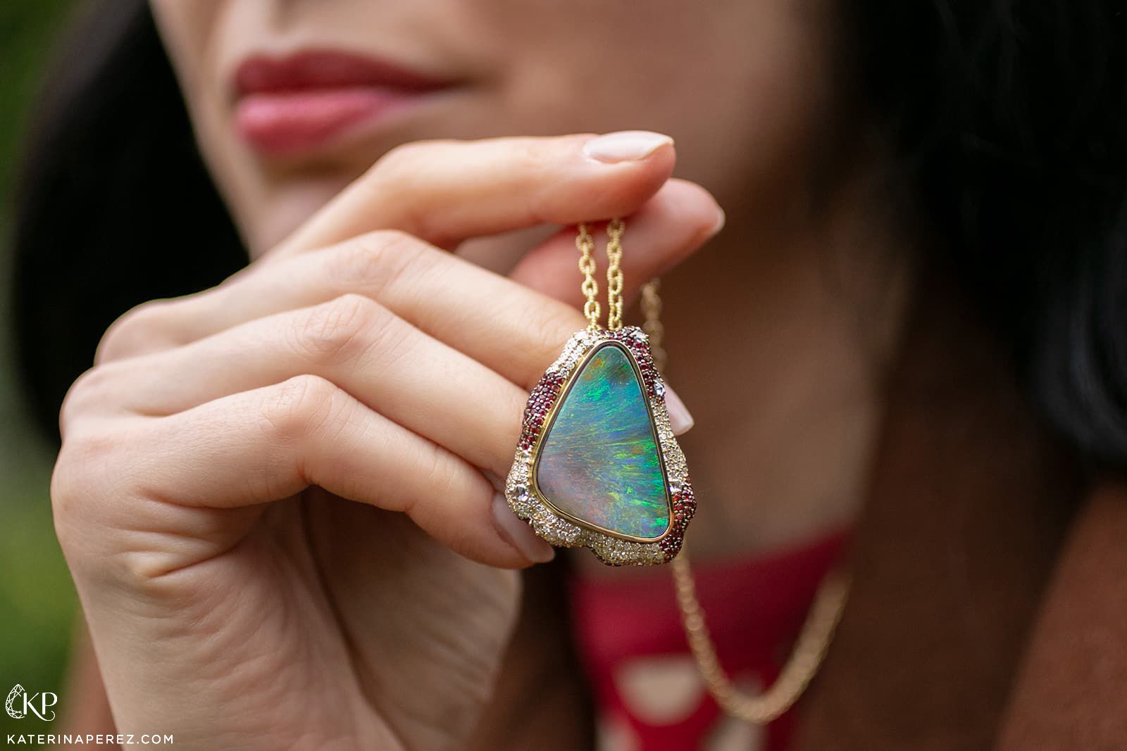  An opal pendant with rubies and diamonds in yellow gold by Emil Weis Opals 