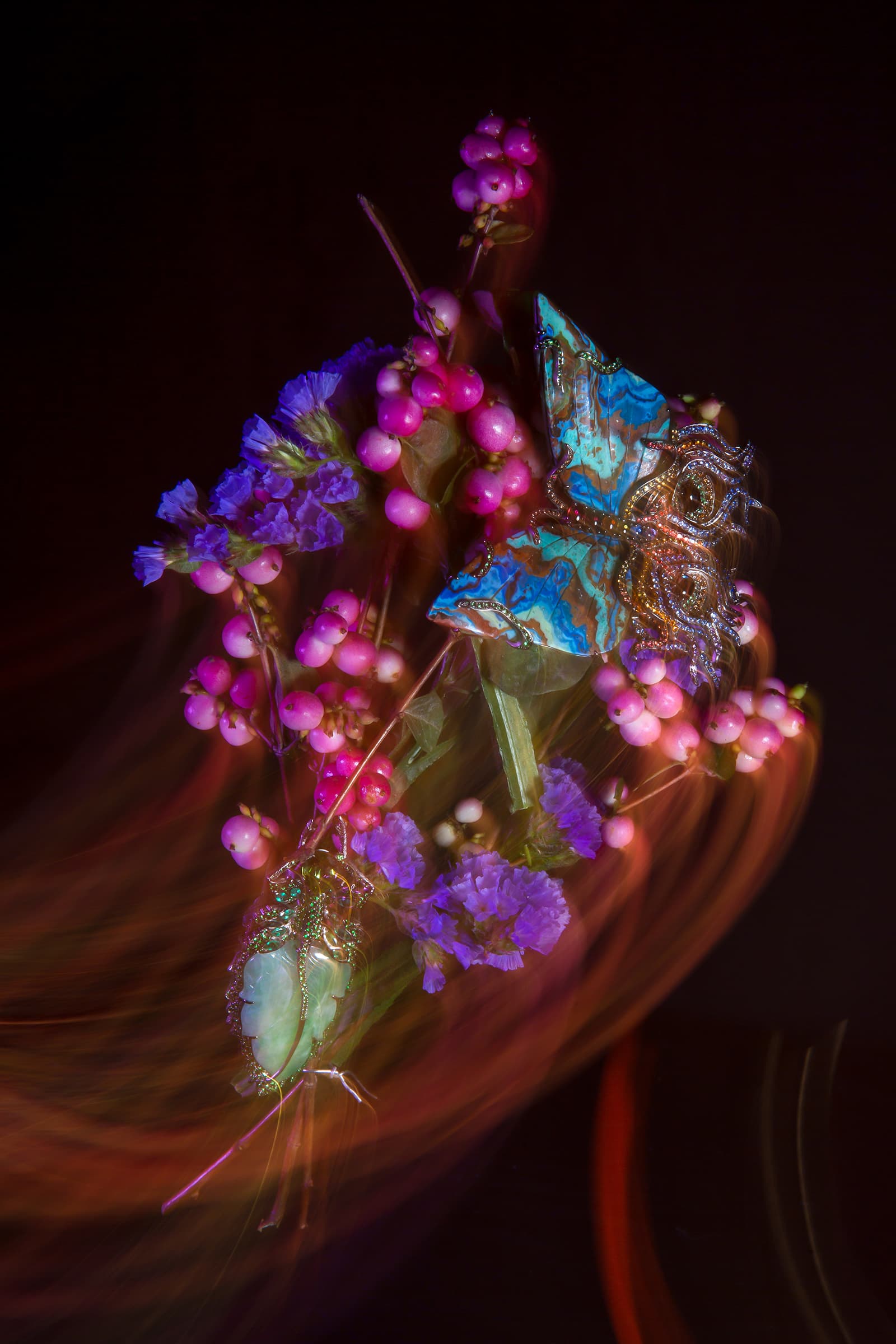 Lydia Courteille Phasme ring with carved jade of 36.7 carats, peridot, emeralds and tsavorites in 18k gold and the Butterfly brooch with rainbow chrysocolla, yellow beryl, garnet, sapphires, tsavorites and fire opal in 18k gold 