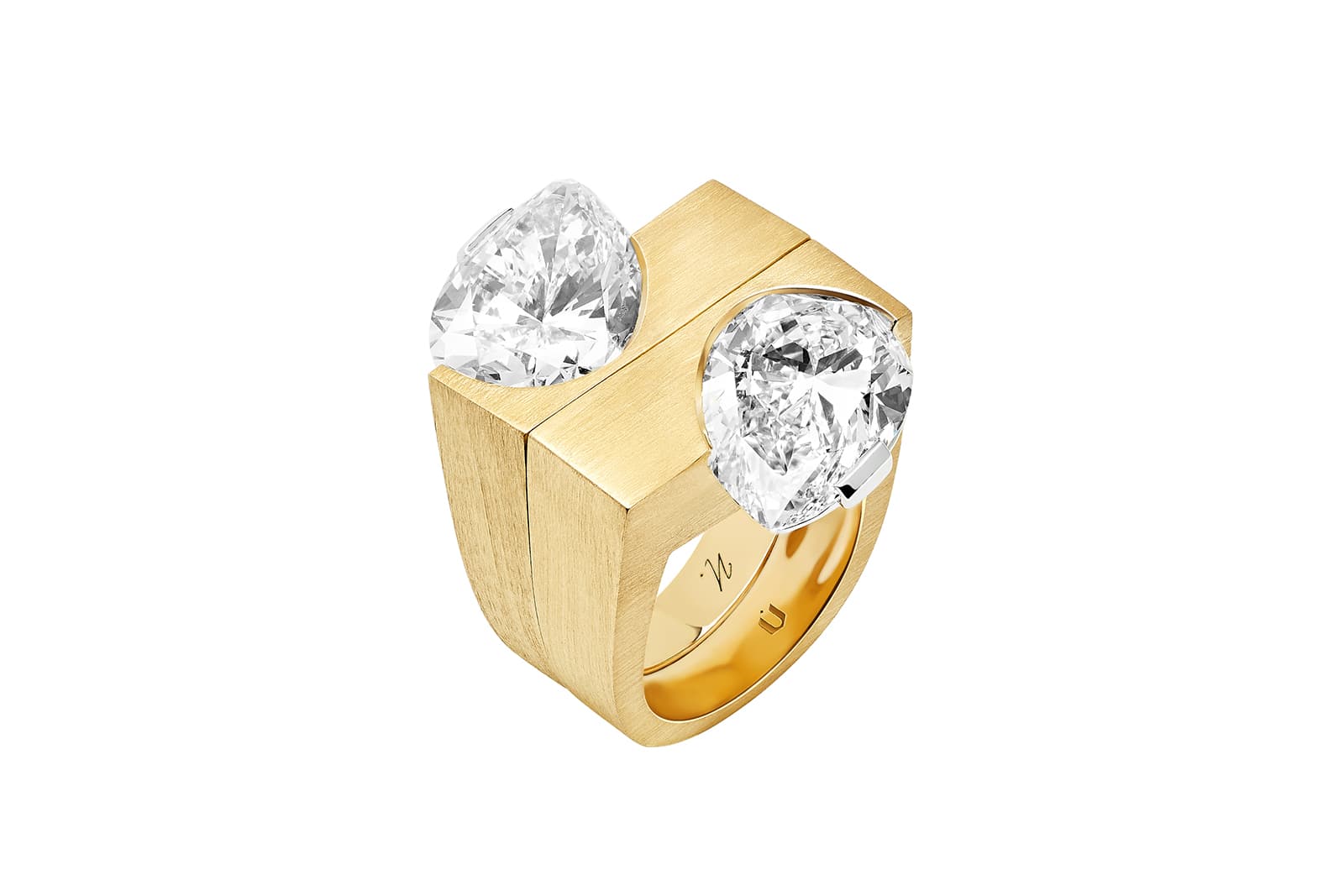  Two pear-cut diamond and 18k yellow gold rings by Nuun Jewels fit perfectly together like two puzzle pieces