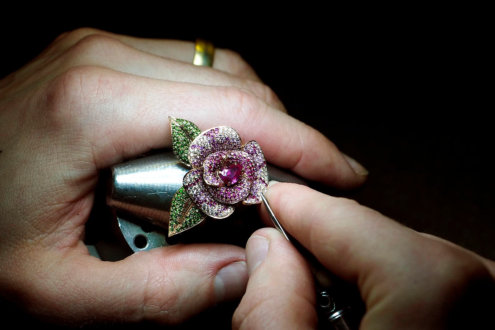  Nigel O'Reilly crafting a Rose ring with petals of pavé-set coloured gemstones 