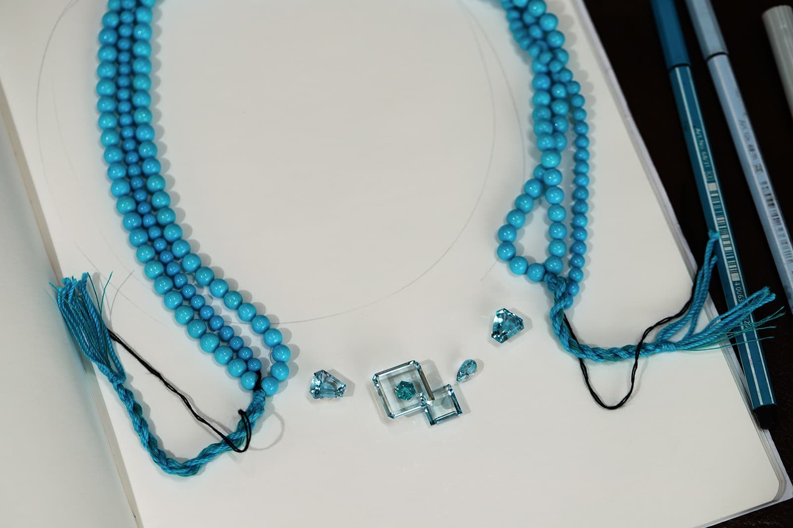  Calla Lily Founder, Emily Tan, drew inspiration from her customer's turquoise beads when selecting aquamarines for this bespoke piece