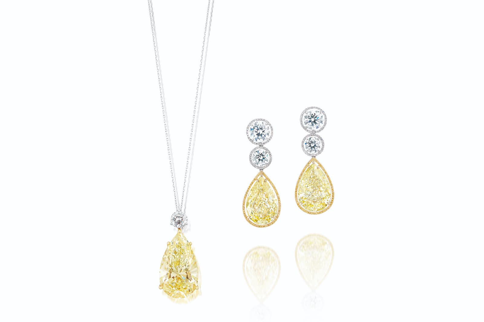 A 25.01 carat fancy yellow diamond and white diamond pendant necklace with matching earrings to be sold by Phillips Hong Kong in November 2021