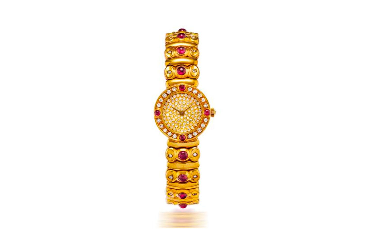 An 18k gold, diamond and ruby-set quartz bangle watch, circa 1990, owned by an Italian family and due to be sold by Bonhams Paris in November 2021