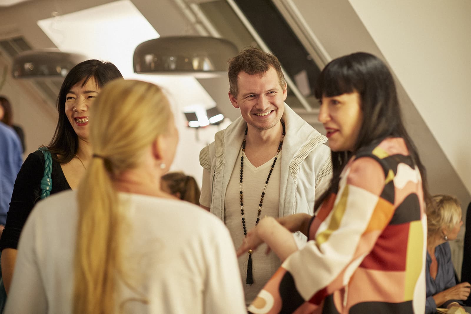  Katerina Perez networks with Joke Quick and Mads Heindorf at the Copenhagen-based event