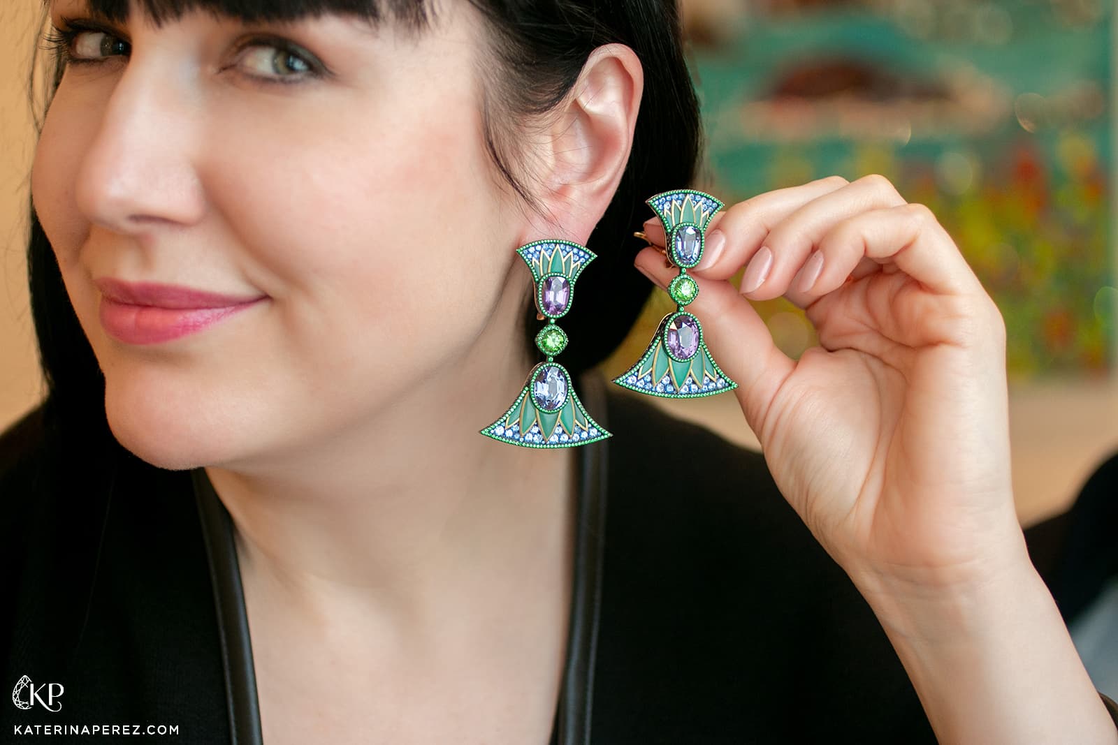 Katerina Perez wears the Antonio Seijo Lotus Flower earrings with four spinels of 20.33 carats, demantoids, diamonds, tsavorites and sapphires 