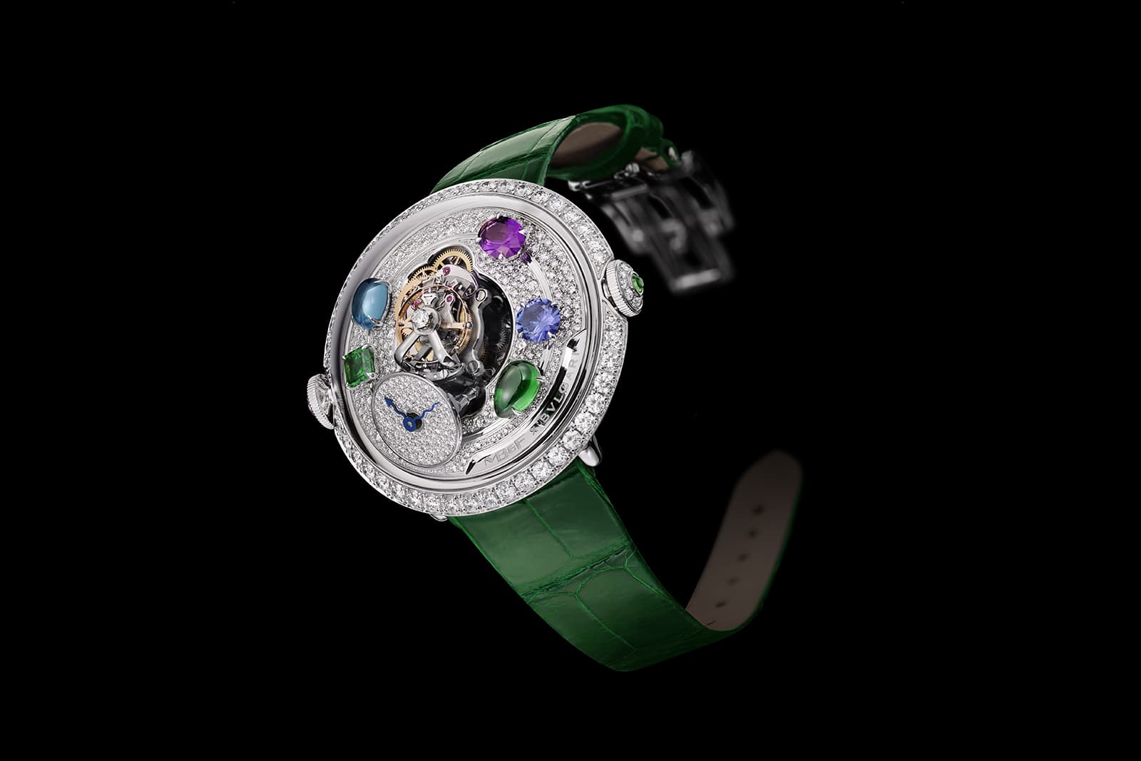  The MB&F x Bulgari LM Flying T Allegra watch is set with diamonds, tsavorites, topaz, amethyst, tanzanite and tourmaline with a green alligator leather strap