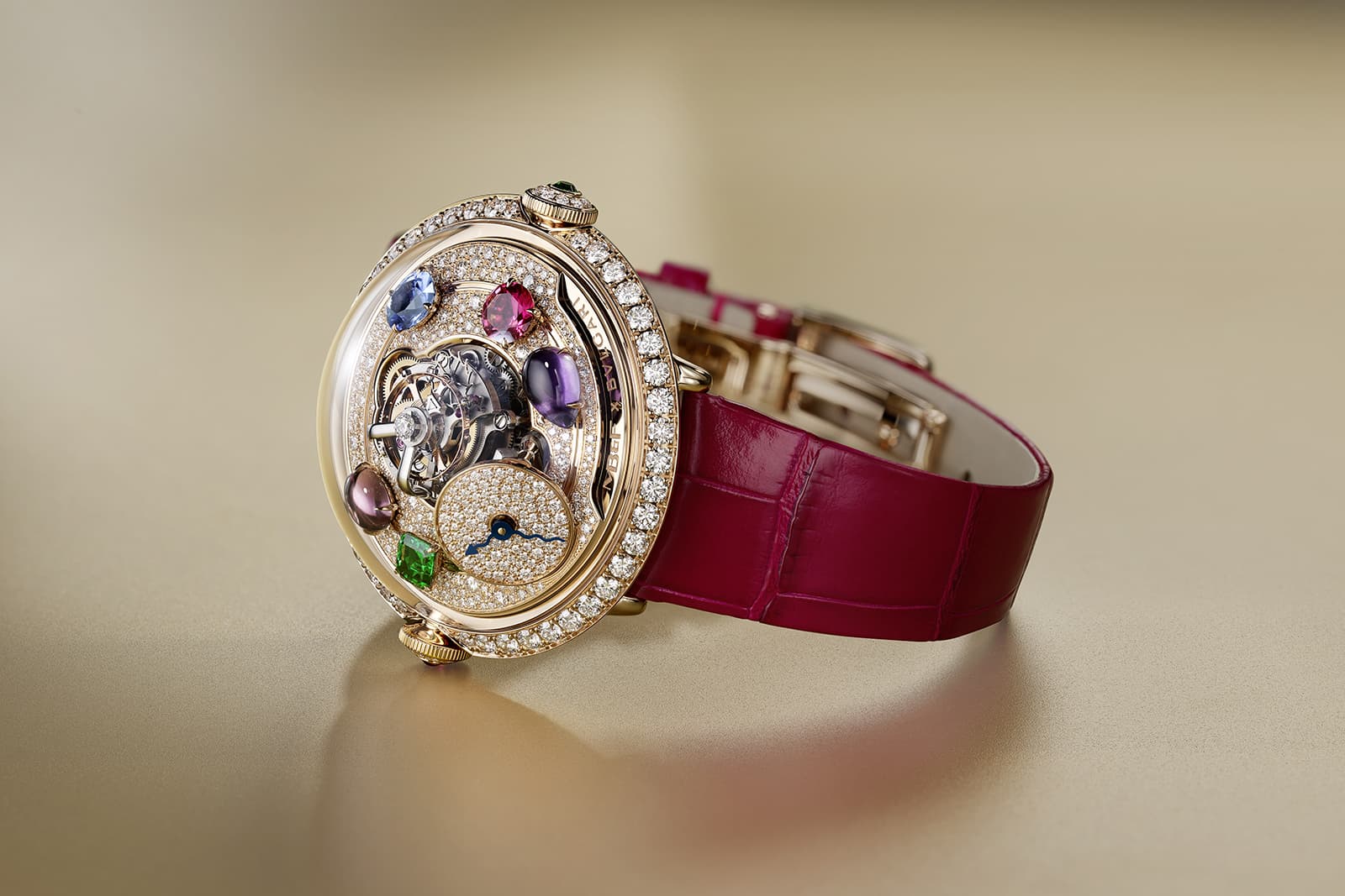 The MB&F x Bulgari LM Flying T Allegra watch with an 18k rose gold case, domed sapphire crystal and raspberry-coloured alligator leather strap