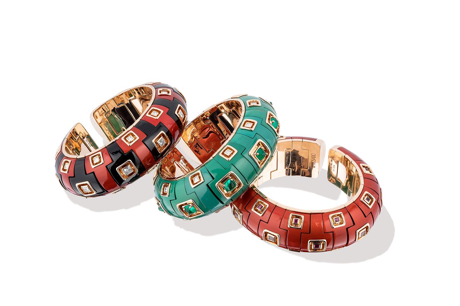 Wilfredo Rosado Tribu bracelets in 18k rose gold with nano-ceramic details, diamonds, Muzo emeralds and rubies 