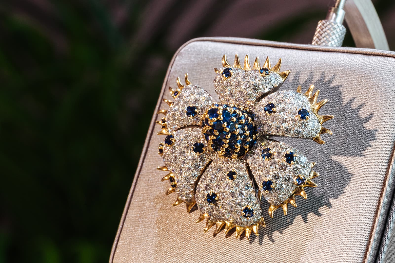 A sapphire and diamond flower brooch by Tiffany & Co. 