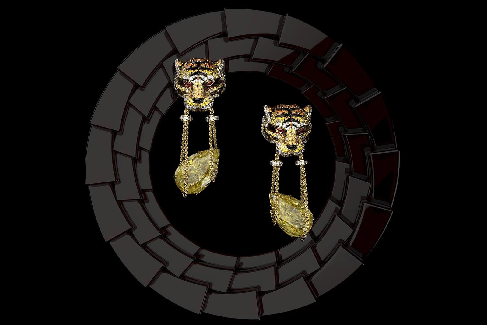  Ming Song Haute Joaillerie Le Tigre Doré earrings with a 10.11ct and 10.02ct fancy yellow pear-cut diamond, brown, orange and yellow diamonds, onyx, ruby eyes and brilliant-cut diamonds, created by Dennis Song 