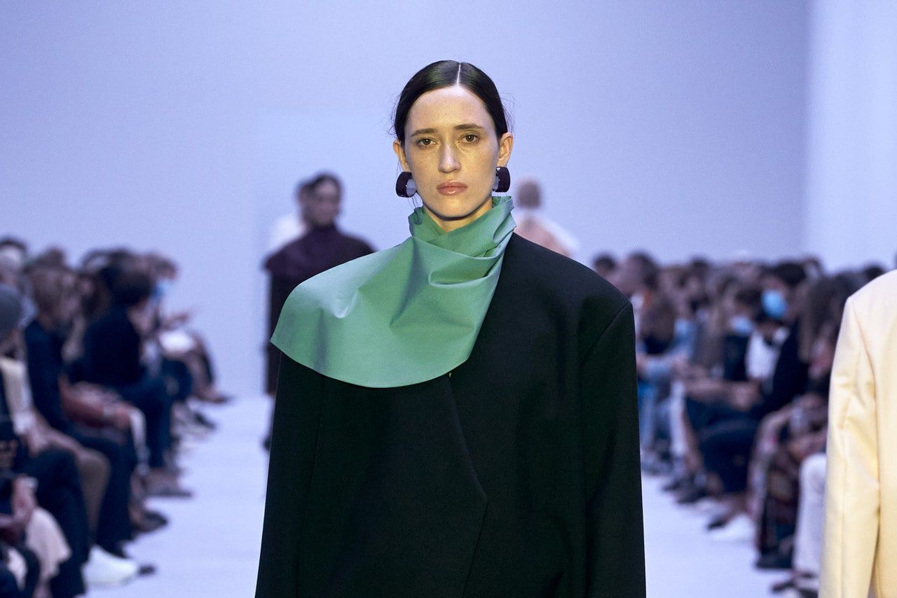  Large hoop earrings on display at the Jil Sander SS22 runway show