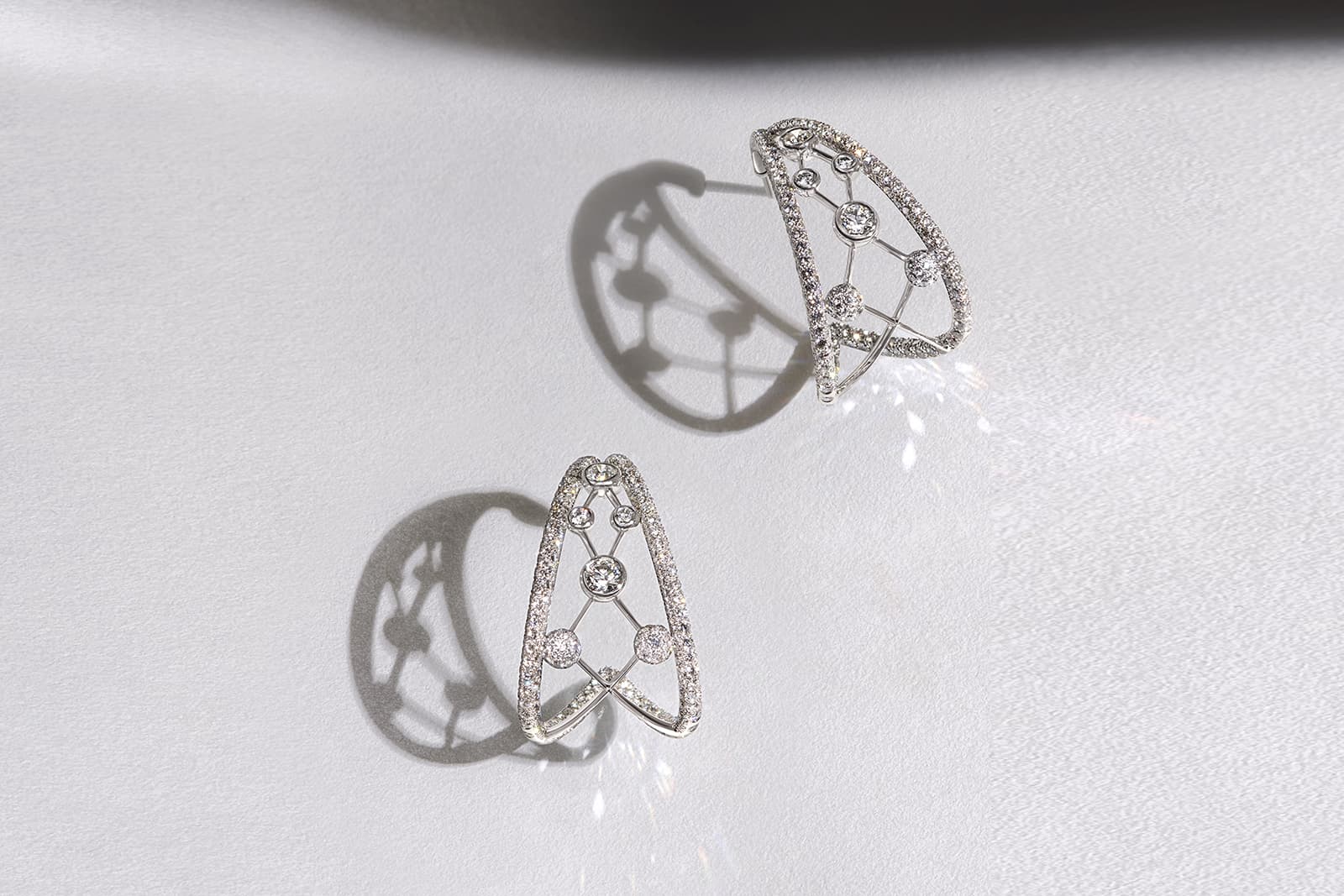  De Beers Jewellers The Alchemist of Light High Jewellery Atomique hoop earrings