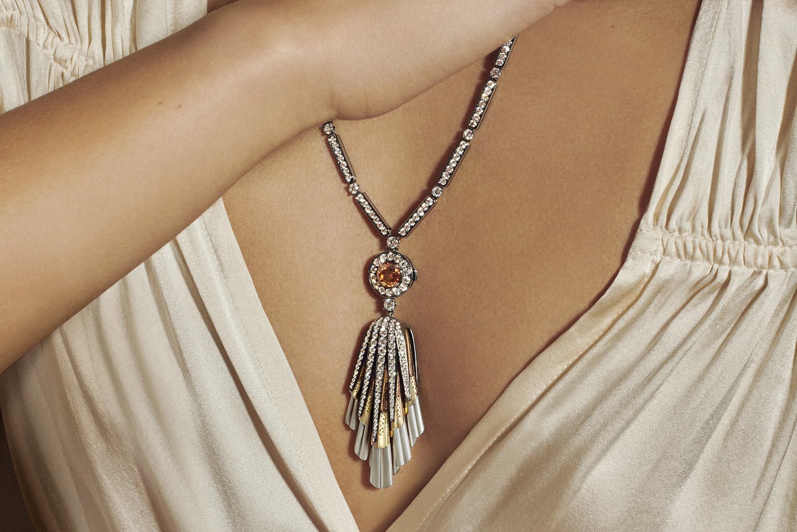  De Beers Jewellers The Alchemist of Light High Jewellery Light Rays tasselled pendant, which can be detached and used as a handbag charm