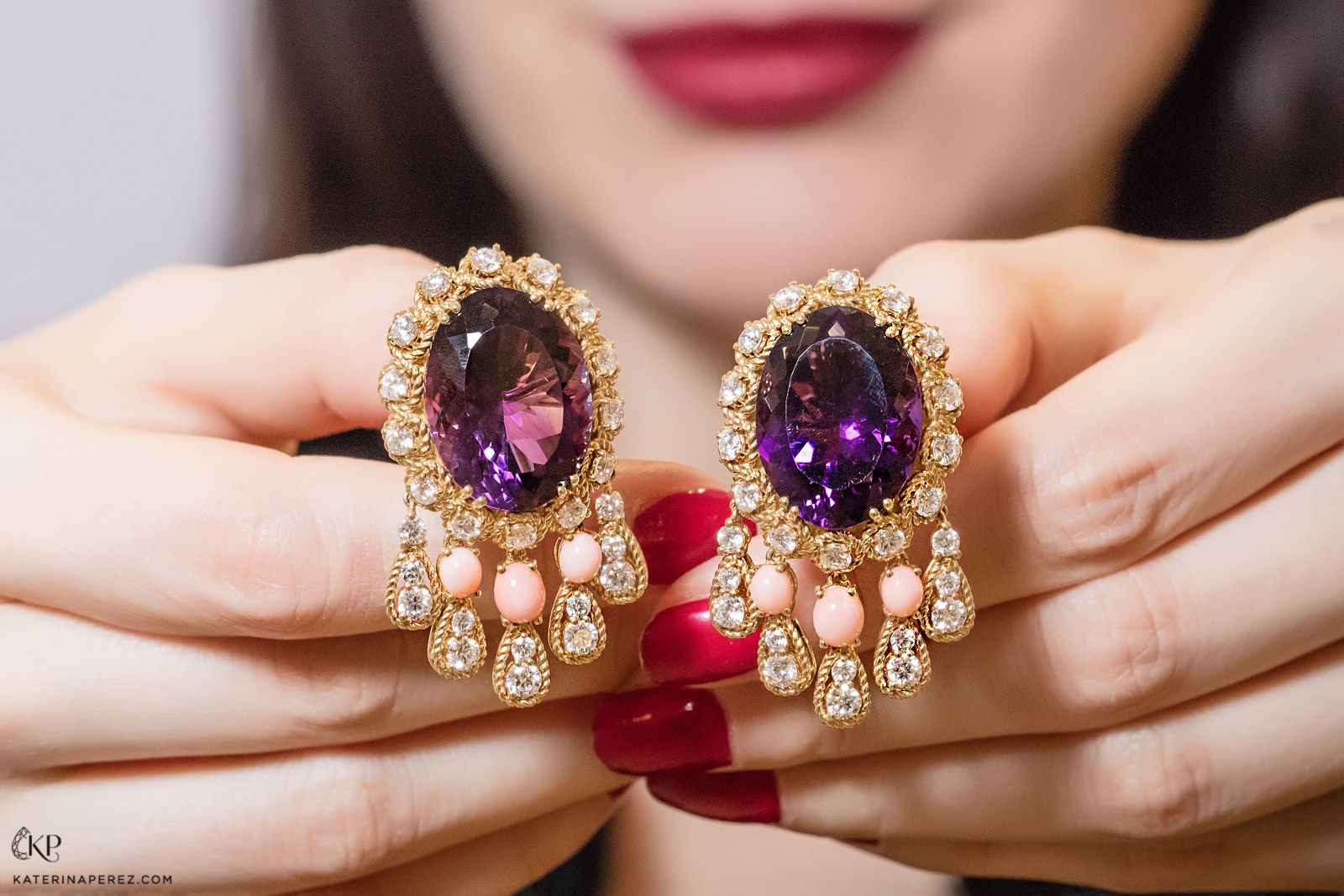  Katerina Perez holds a pair of amethyst earrings by Veschetti