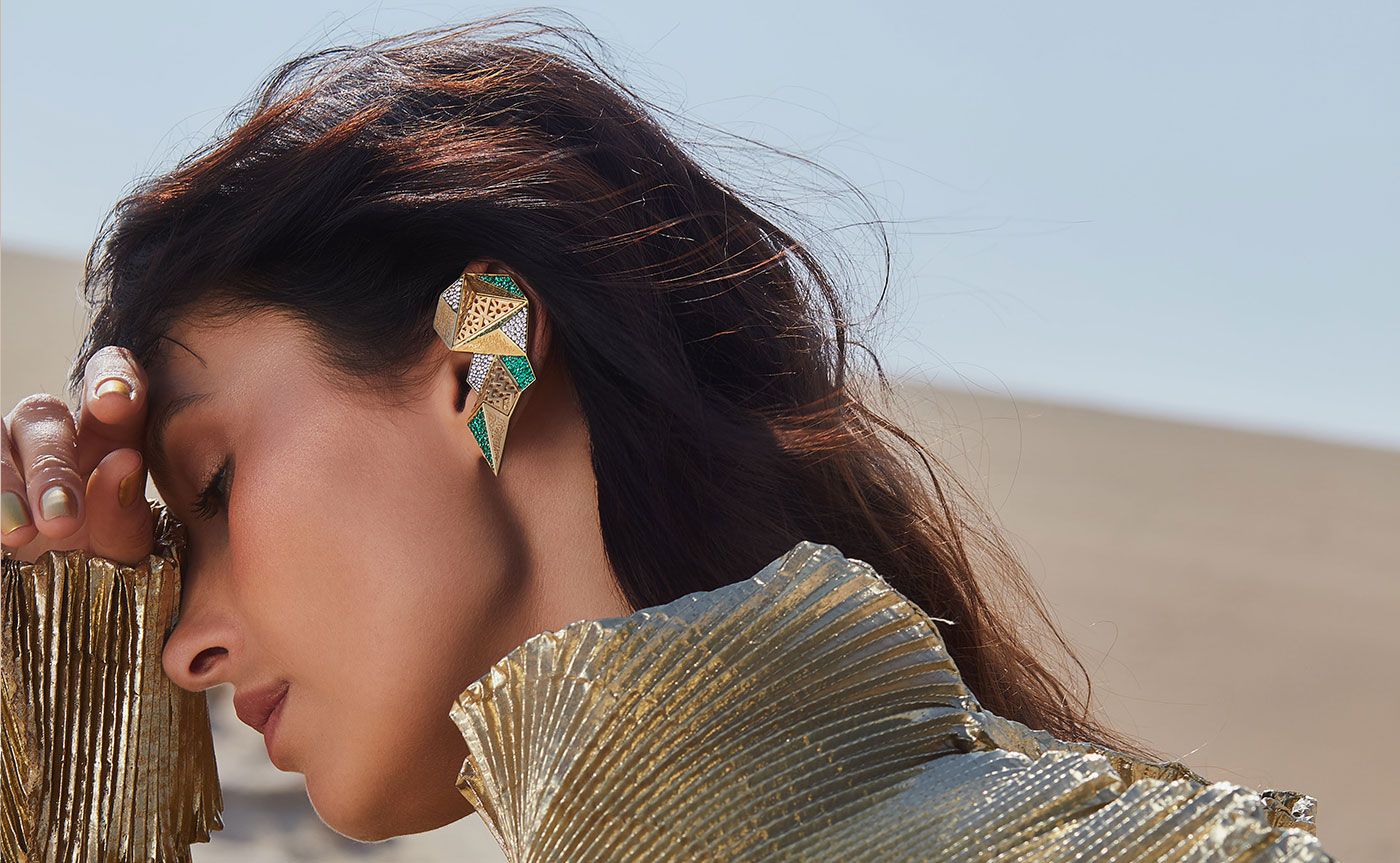 Roshan ear cuff in emeralds and diamonds by Yataghan