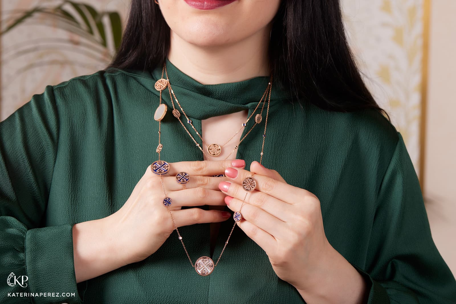  Katerina Perez wears necklaces and rings from the Bayt Damas Lace collection