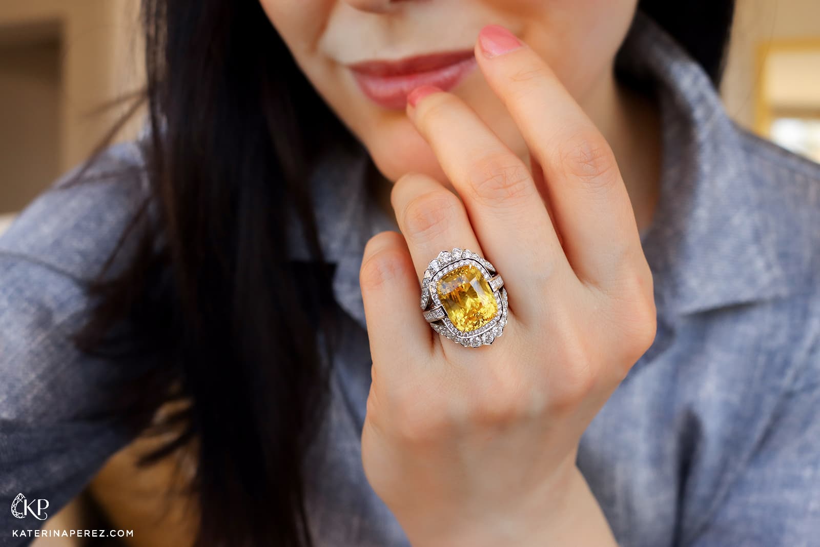 Katerina Perez wears an Atelier Pino Spitaleri ring with a yellow sapphire surrounded by diamonds